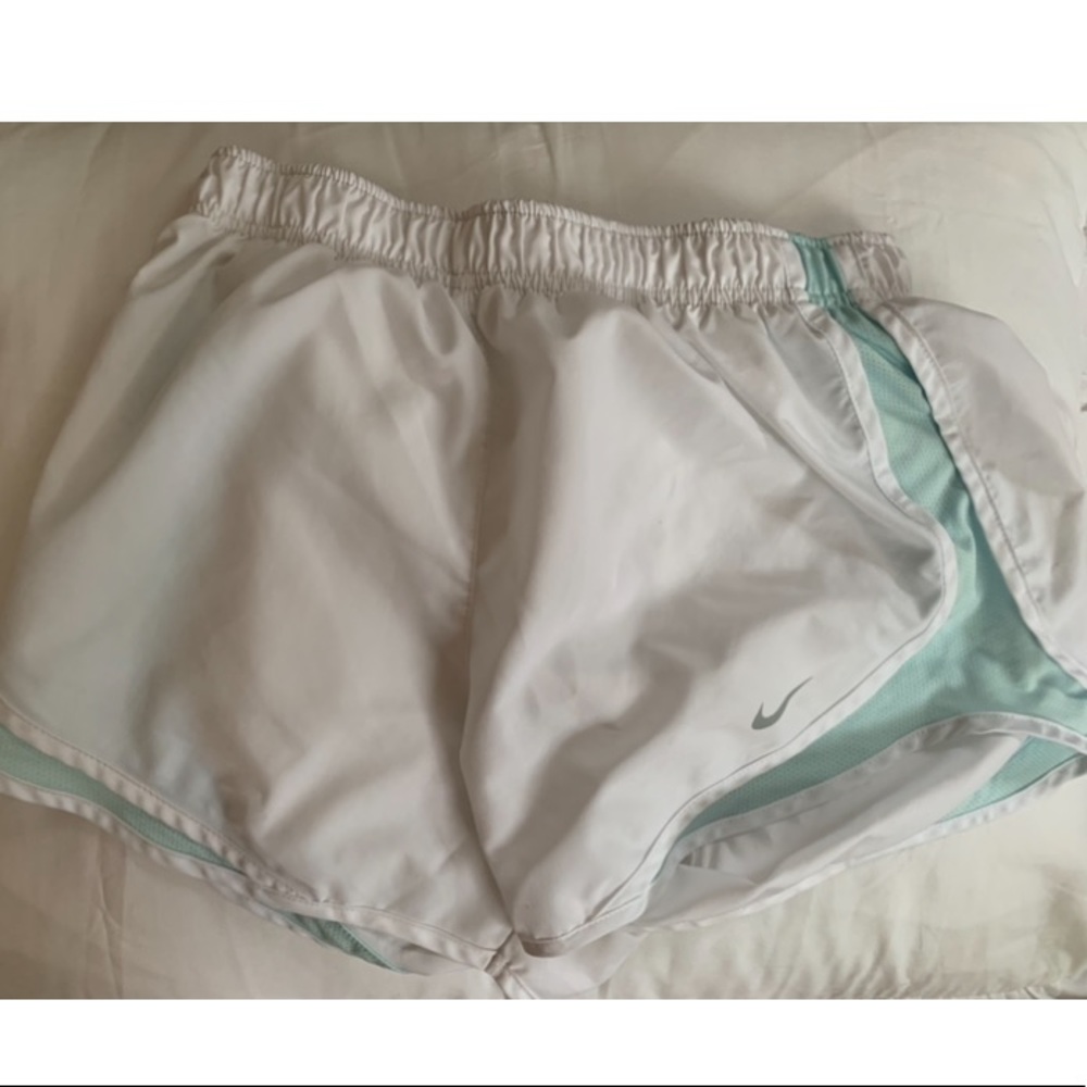 White and blue Nike dri-fit running shorts